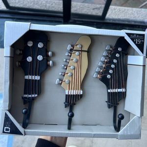 Guitar shaped wall hooks